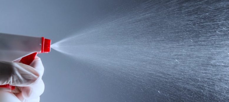 hydrogen peroxide sprayed from spray bottle in cleanroom